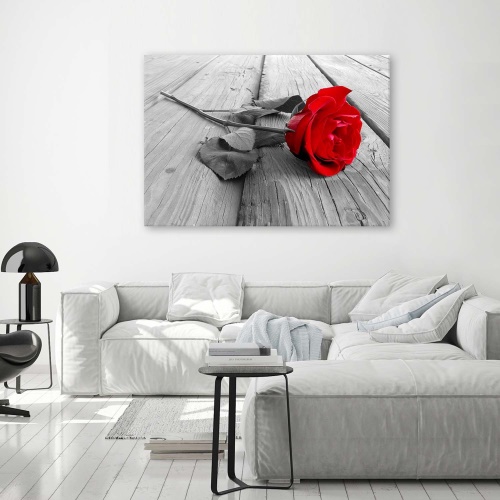 Obraz na plátně Červená růže na dřevěné podlaze