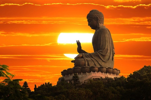 Samolepiaca tapeta socha Budhu pri západe slnka