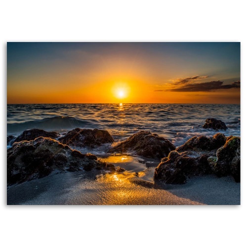 Obraz na plátně Západ slunce na pláži